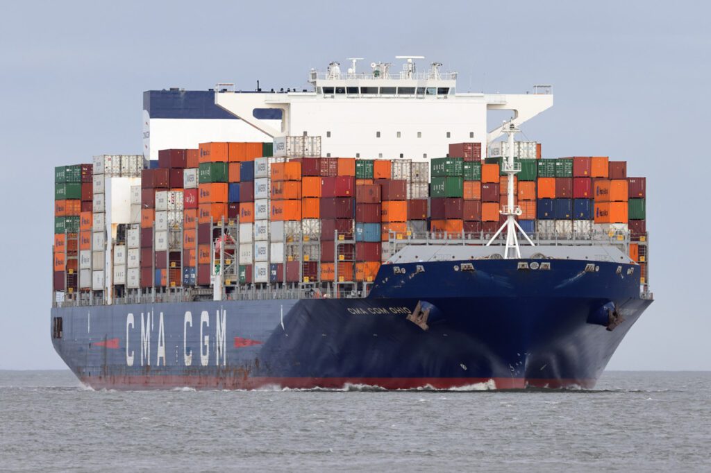 Cargo Ship loading with containers.